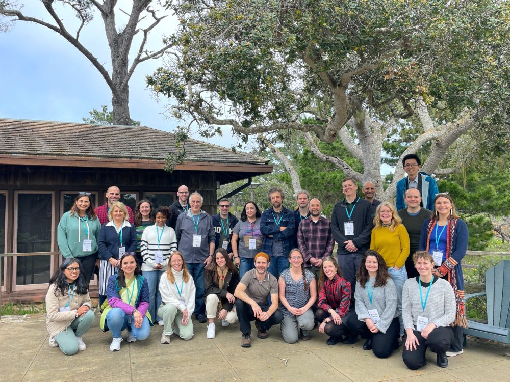 a group of 30 marine mycologists from 4 continents posing at Asilomar for a photo