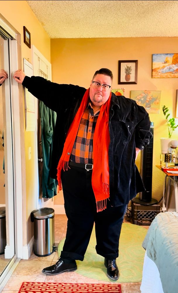 Me, again, standing in my room farther away, leaning against the wall with my right hand. 