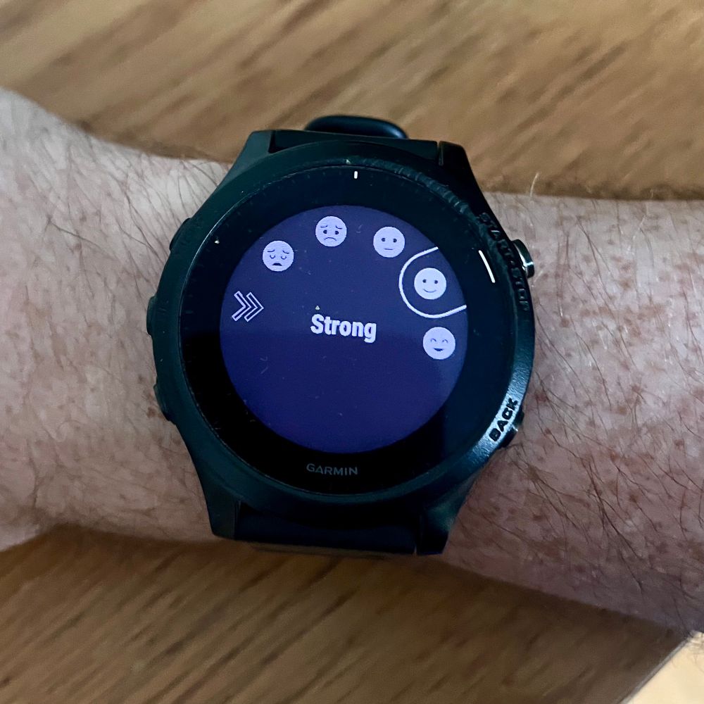 Watch showing a rotary display with faces and the text strong