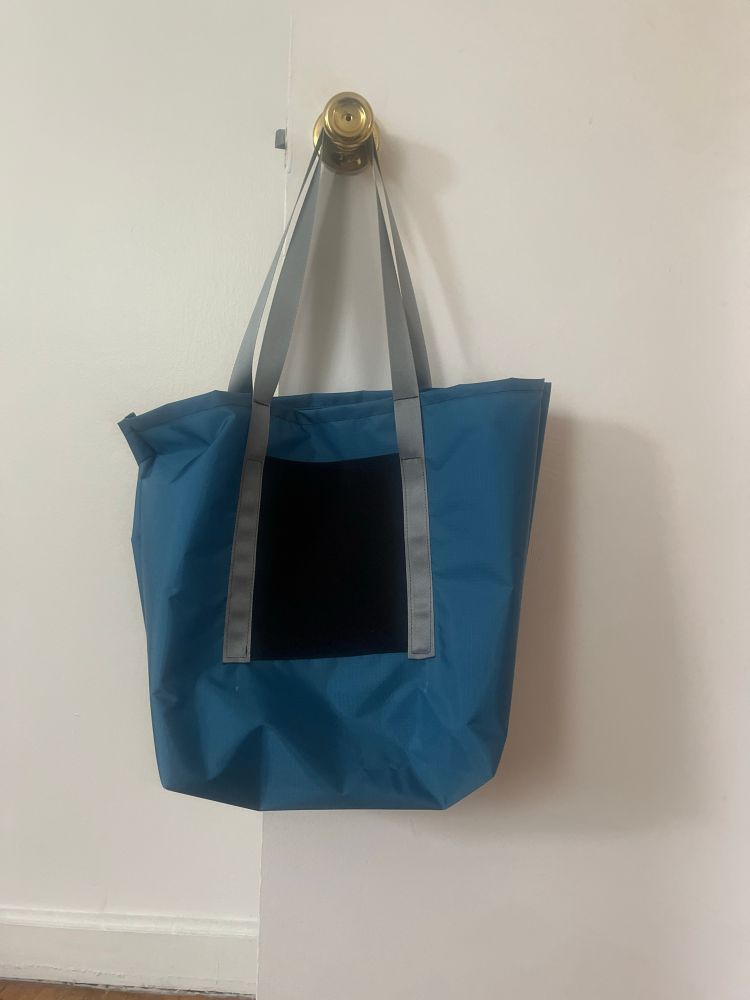 a blue tote bag