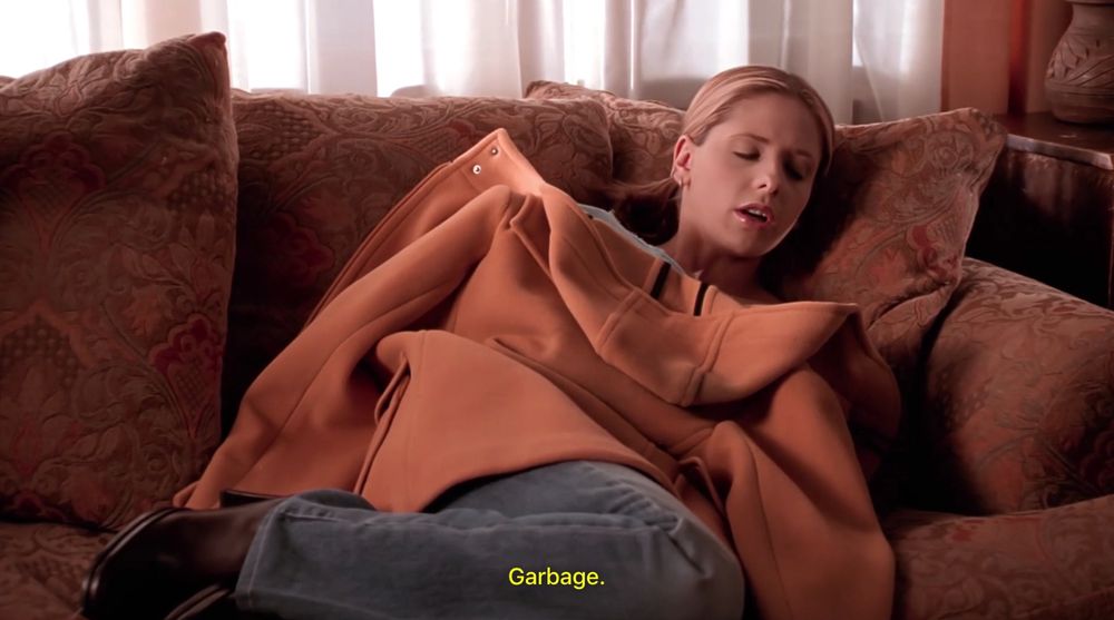 Buffy talking in her sleep on her couch saying the word, “Garbage” from s6