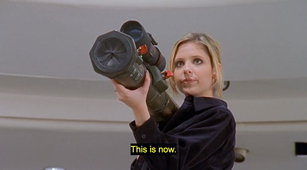 Buffy holding a bazooka, saying, “this is now” from s2