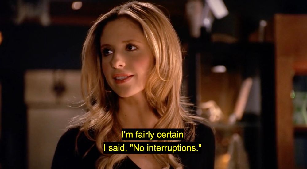 Buffy, looking great, saying, “I’m fairly certain I said no interruptions” from s5