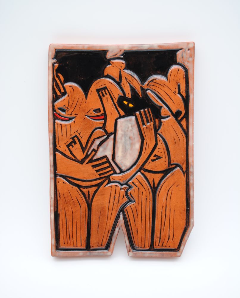 rectangular clay tile with the image of a couple holding their little werewolf baby, one has top surgery scars