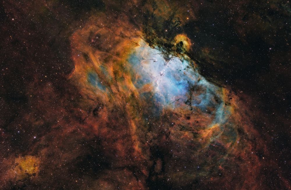 The eagle nebula. This version of the image differs from the original post by having richer colors and a more defined core, emphasizing the pillars of creation area.