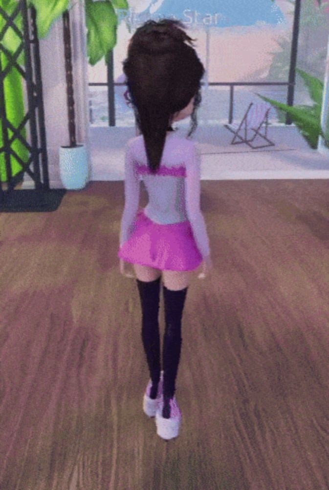 a girl in a pink skirt and knee high socks is standing on a wood floor