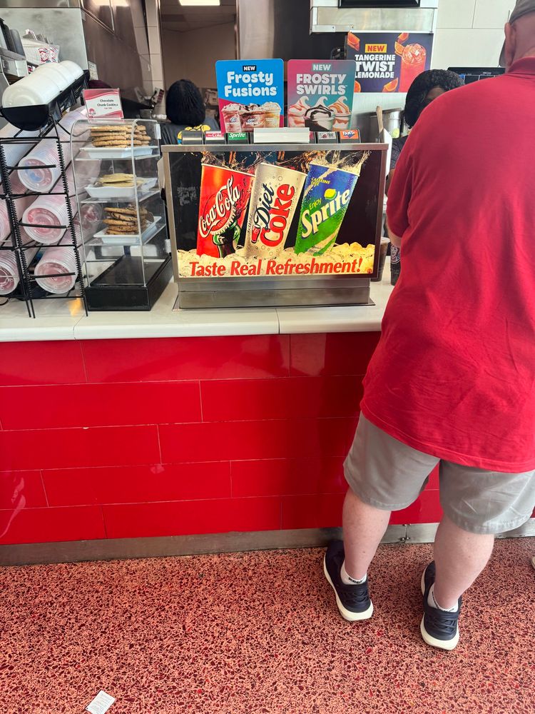 An...80's? 90's?....Coca Cola advertisement still on display in 2025 in the Orlando airport