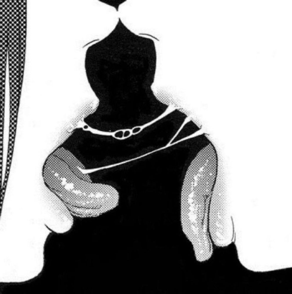 Strands of saliva stretch between two hot open mouths. 