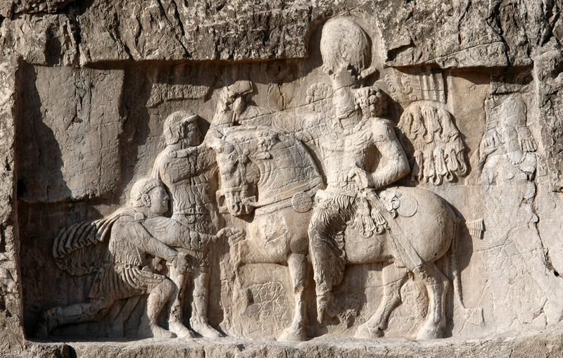 Naqš-e Rustam, Relief of Shapur I receiving the surrender of Philip and capture of Valerian Date 260 CE–272 CE Creator Marco Prins Licence CC0 1.0 Universal Linked Legio I Parthica, Legio III Gallica, Legio III Parthica, Legio XII Fulminata, Legio XV Apollinaris, Legio XVI Flavia Firma, Naqš-e Rustam, Naqš-e Rustam, Relief of Shapur I, Palmyra (4), Sasanian Rock Reliefs, Sasanians, Shapur I Categories Persia Tags Emperor, King, Relief We share high-resolution versions of our original photographs. Contact us for further information and be sure to make a note of the URL of the photos you are interested in. 