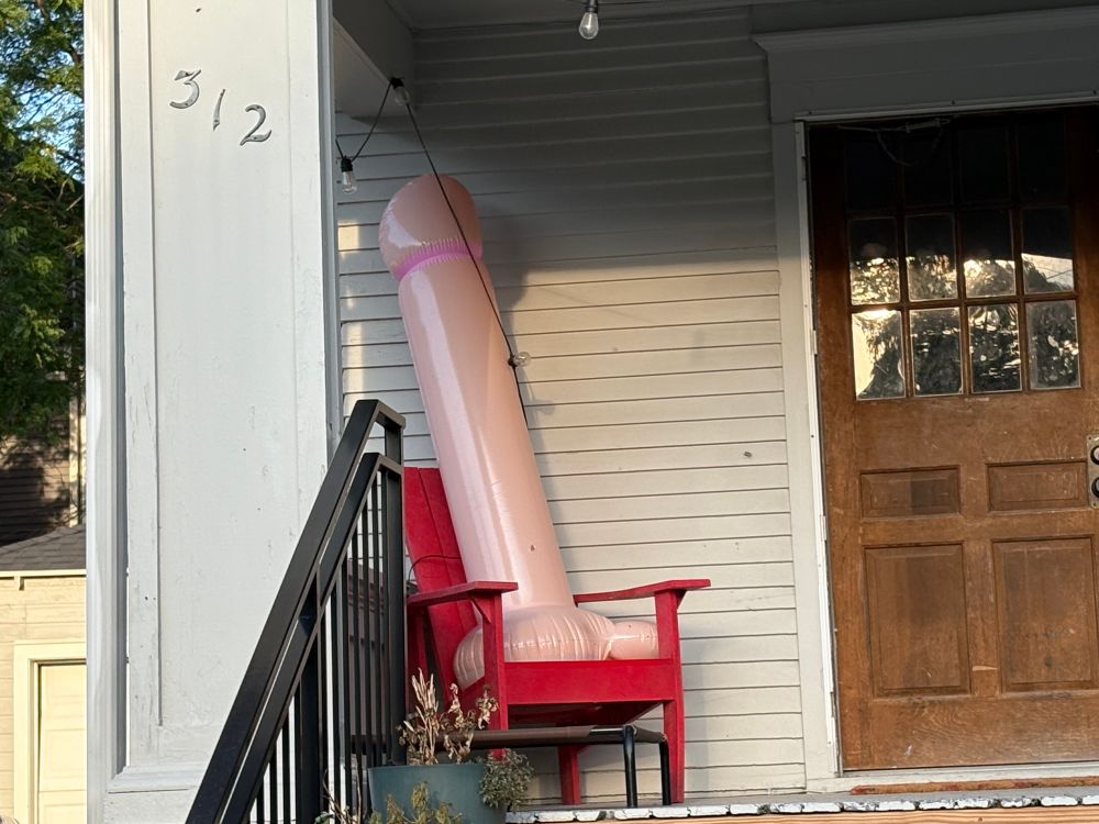 A quite phallic blow up on our neighbors porch