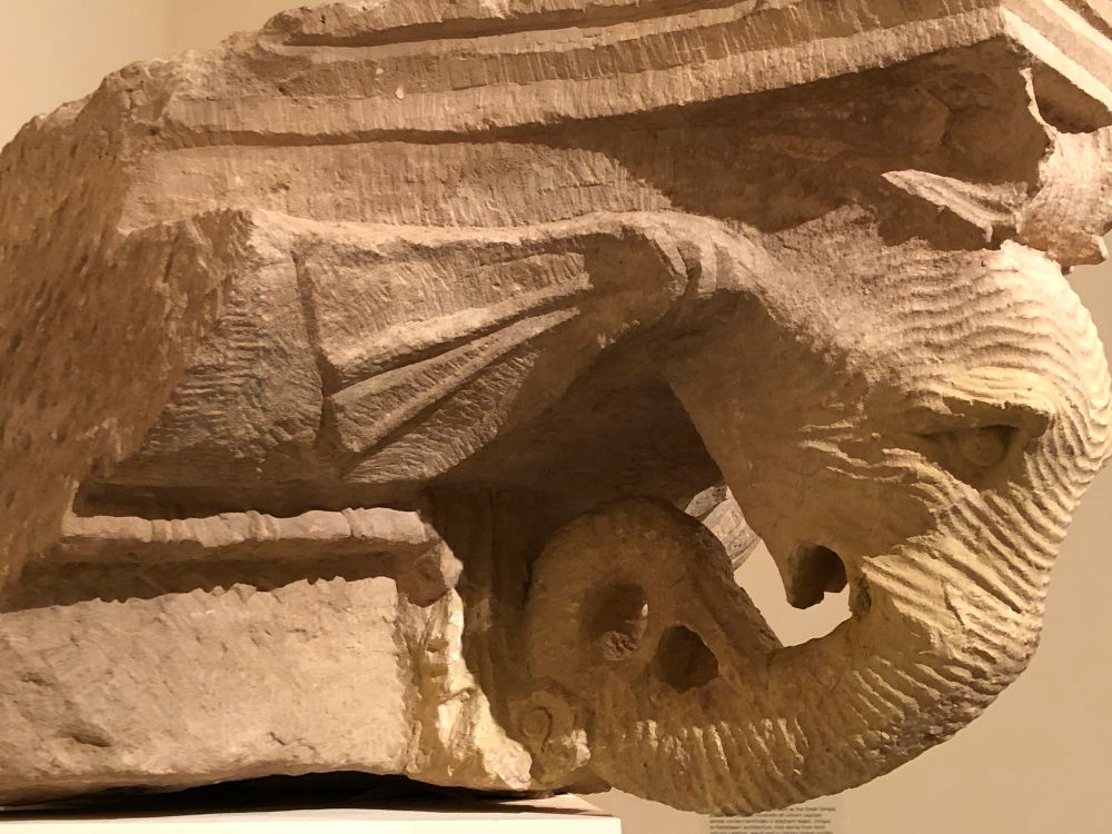 Elephant Capital
1st century в.c.-early 1st century A.D.
Limestone
Petra, Great Temple
Department of Antiquities of Jordan, Amman
Excavations at the building known as the Great Temple at Petra uncovered hundreds of column capitals whose corners terminate in elephant heads. Unique to Nabataean architecture, they derive from lonic column capitals, which end in volutes (spiral scrolls) at either side. Some adaptations have four volutes, one at each corner, which are transformed in this design into elephant heads whose trunks evoke the spirals of the original form. The elephants may refer to Dionysos and his mythological journey to India.
