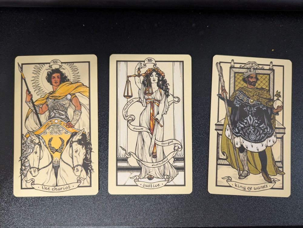 3 card tarot spread: Chariot, Justice, King of Wands