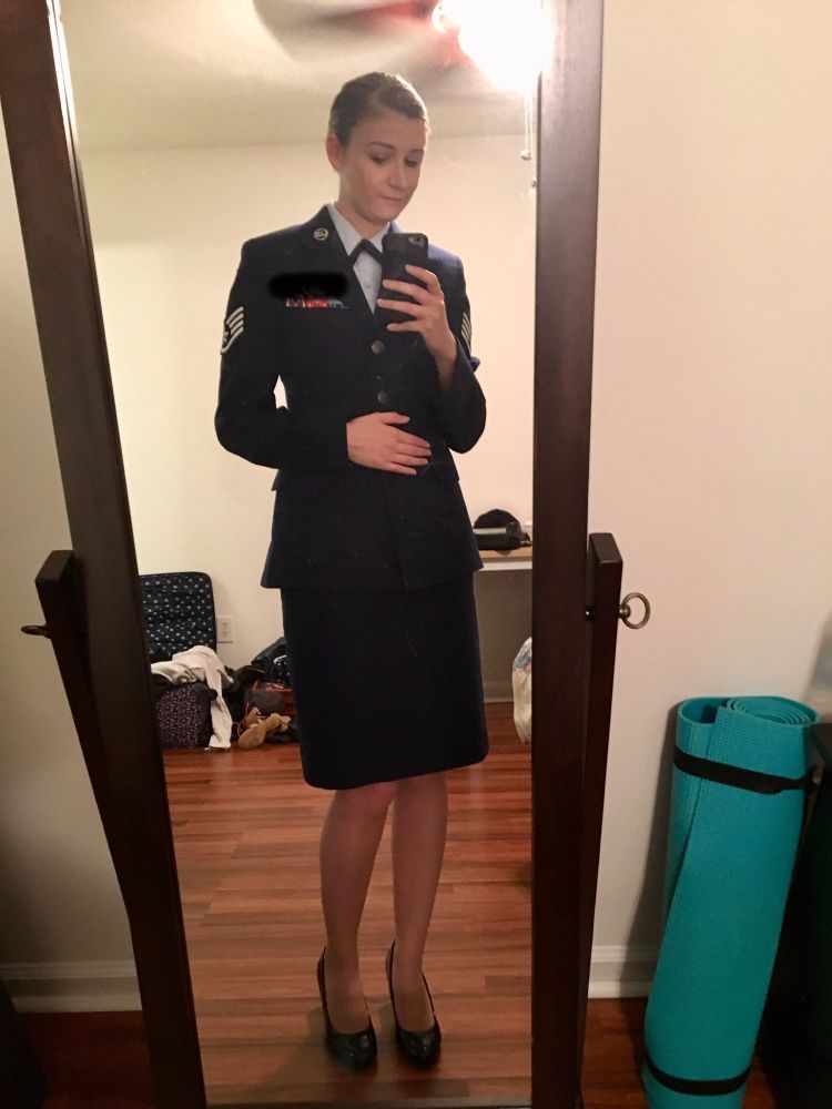 A mirror picture of Crev wearing her USAF Dress Blues