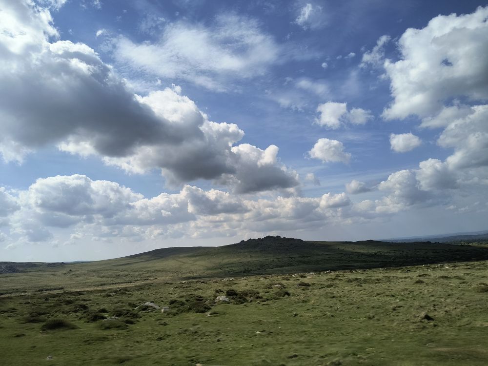 Tor in Dartmoor, with wide sky.