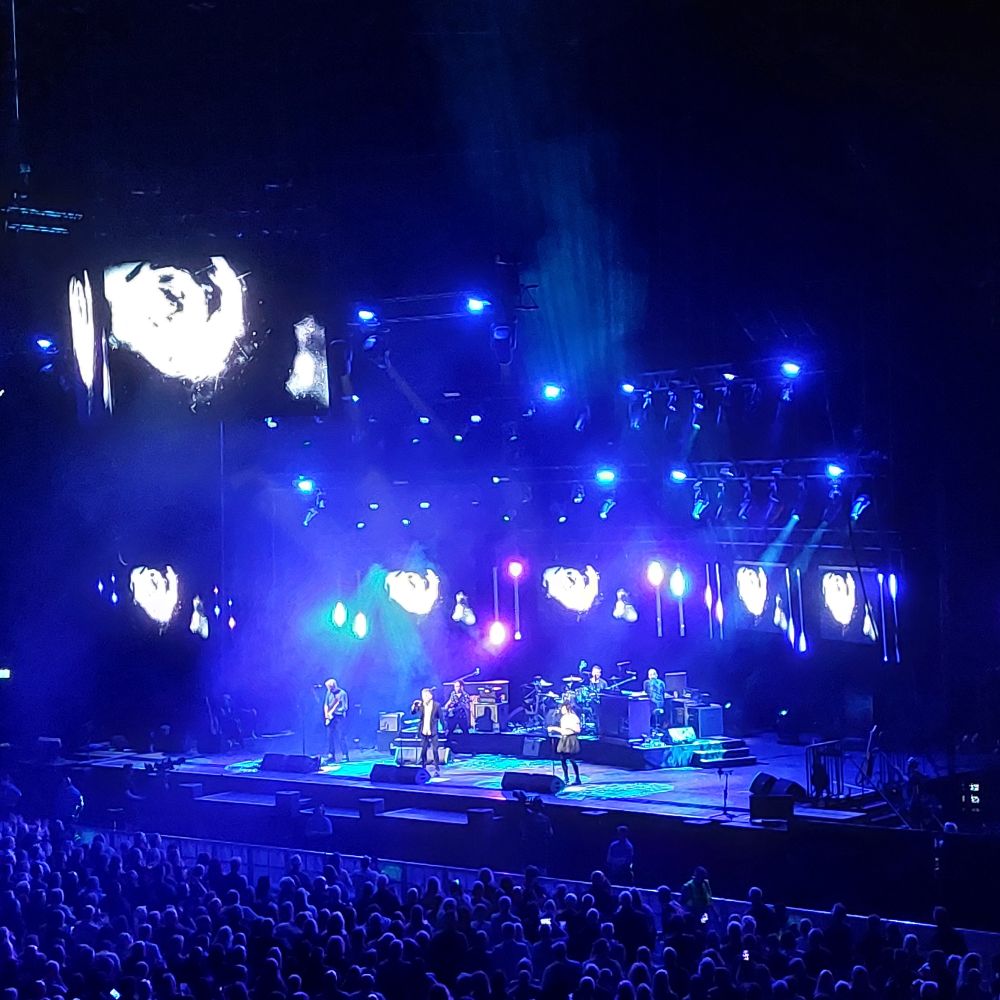 Deacon Blue on stage at the Hydro in Glasgow. They're quite far away.