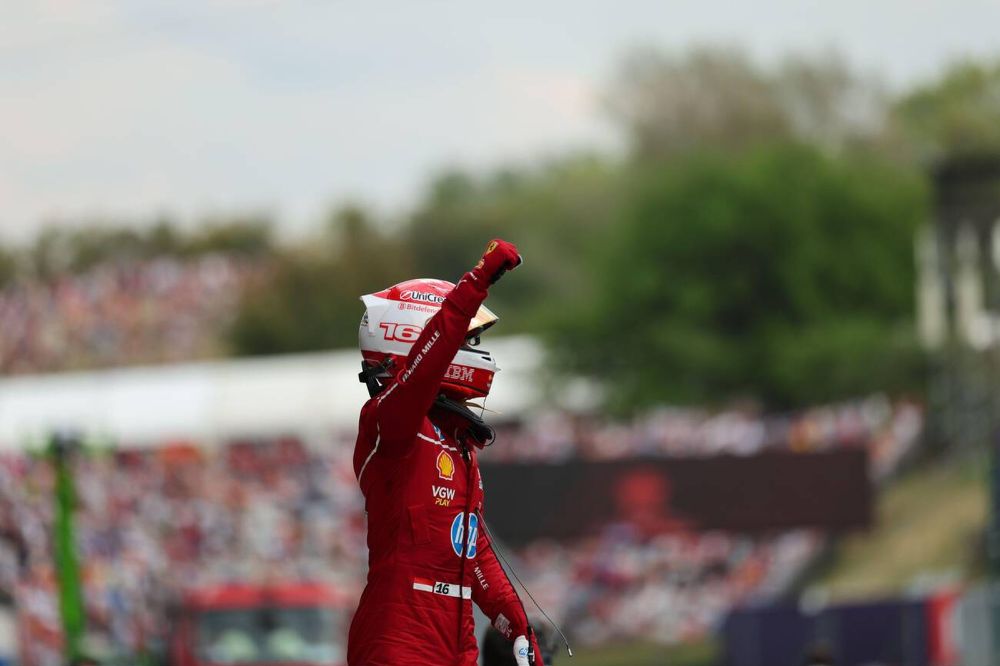Charles Leclerc celebrating after taking pole for the Hungarian Grand Prix.