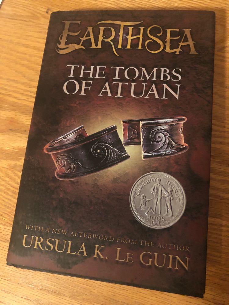 Book cover of The Tombs of Atuan by Ursula K LeGuin
Newbery Honor book…though in any sane world it would have won. 