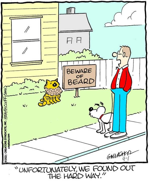 Heathcliff sits next to a sign that reads 