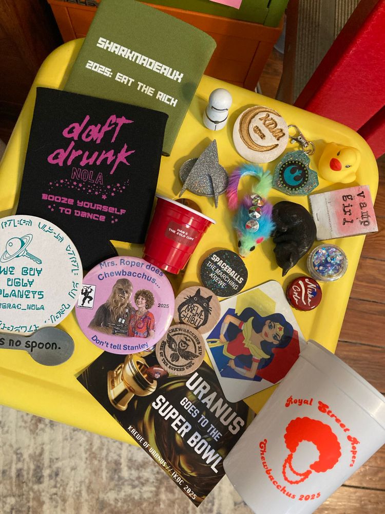 Collection of “throws” from Chewbacchus parade. Stickers, cups, magnets, koozies 