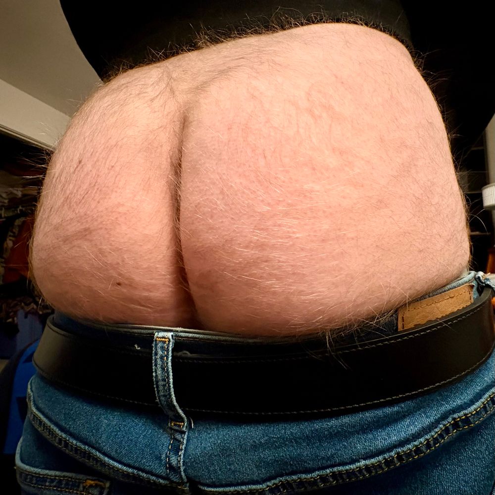 My fat, hairy butt, hanging out above my jean’s waistband.