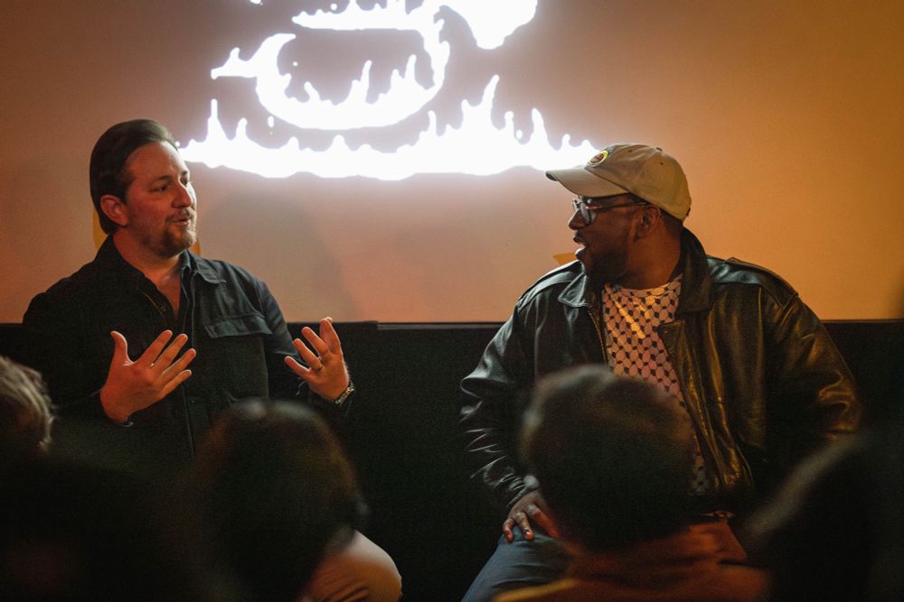 handsome men talking about the intersection of baseball and film