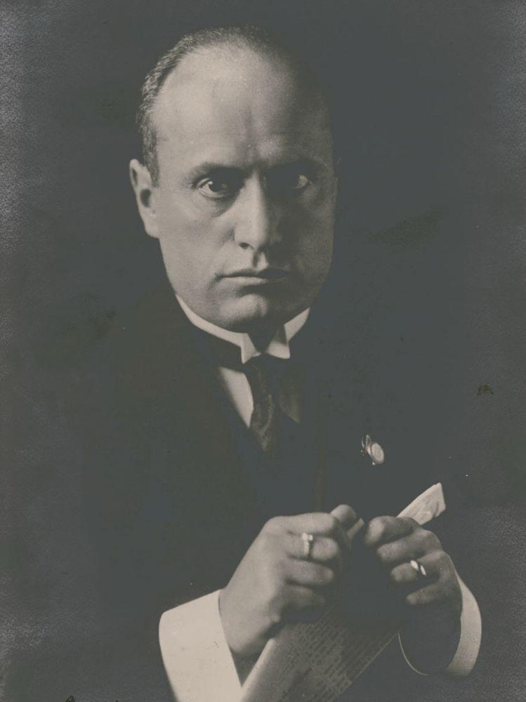 Mussolini looking like the Godfather but also with Miller’s narrow, dead-eyed stare