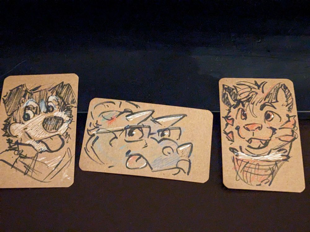 headshots of a dog, a dino, and a yeen