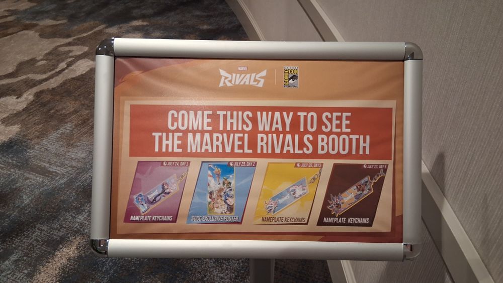 Sign for the Marvel Rivals booth at the Marriot Marquis in San Diego showing all the freebies they're giving away.