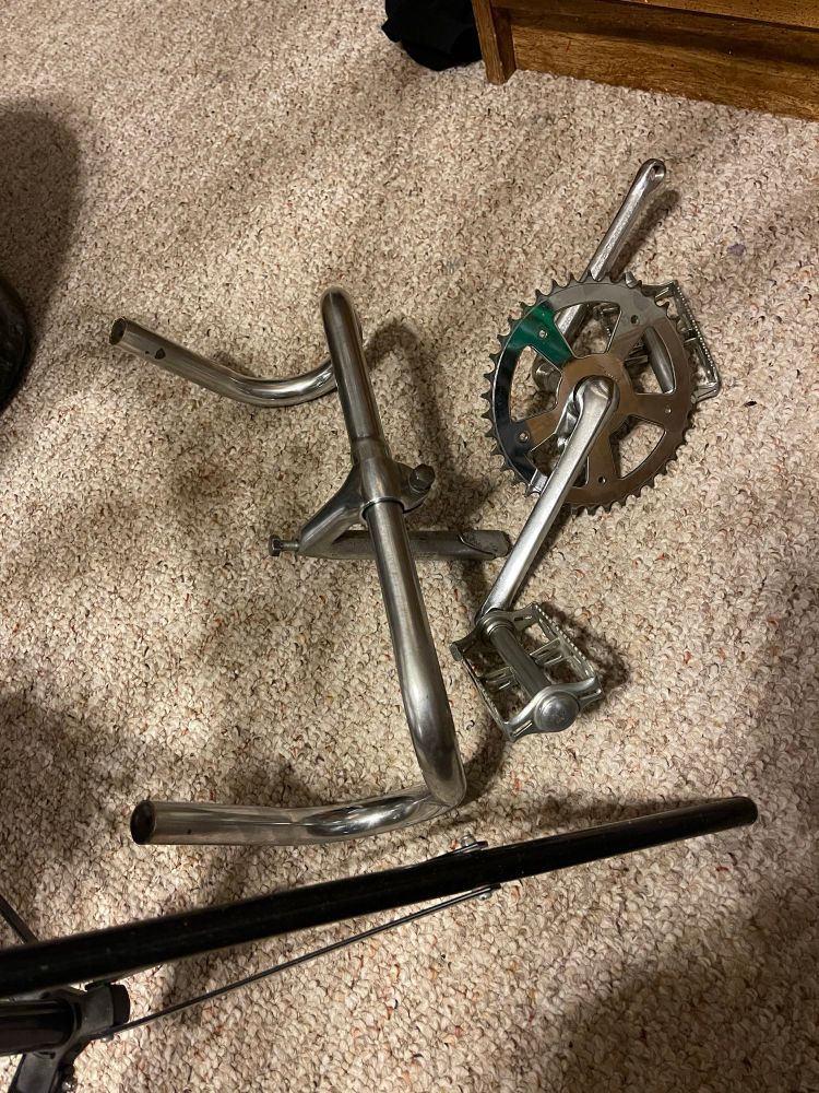 more chrome components cleaned up a bit. handlebars, pedals, crankset, etc. 