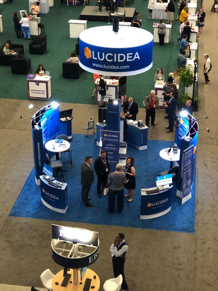 An overhead view of Lucidea's booth at an SLA event.