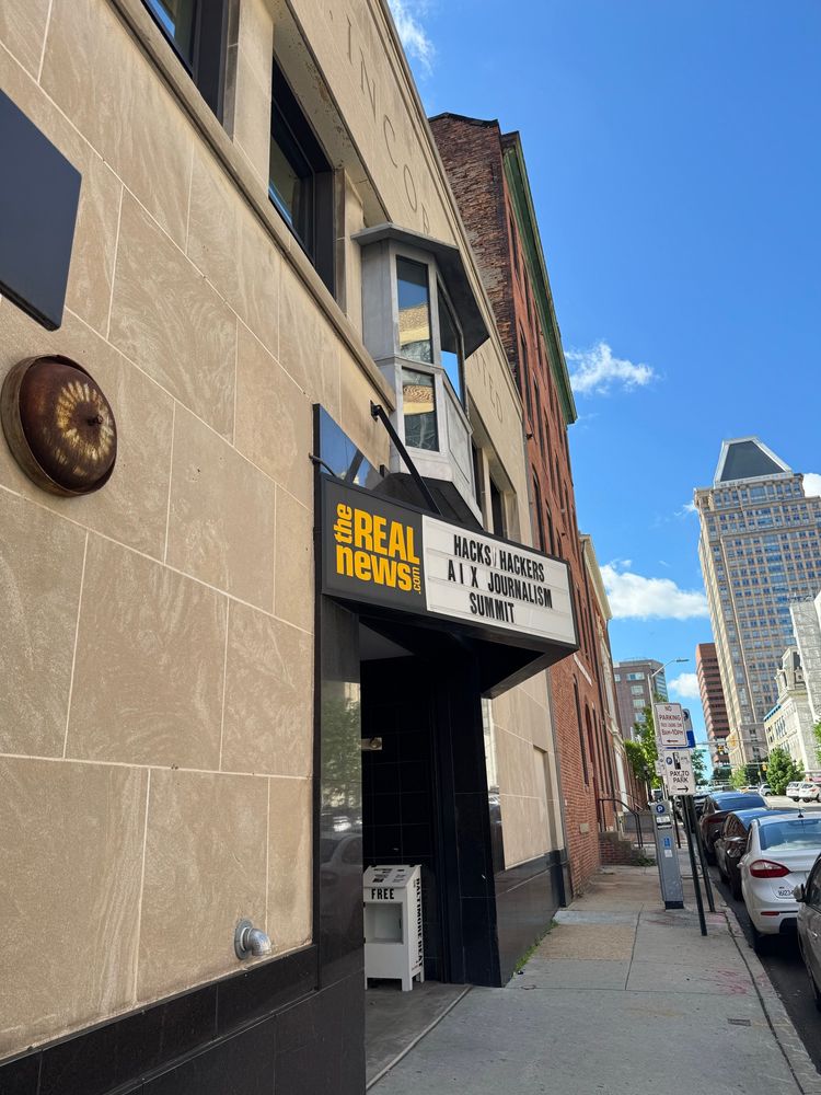 The conference title on the marquee outside - hosted at the Real News Network