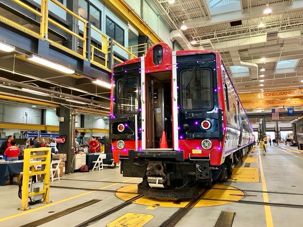 A close-up shot of the Metro-North Holiday Lights train inside of the shop.