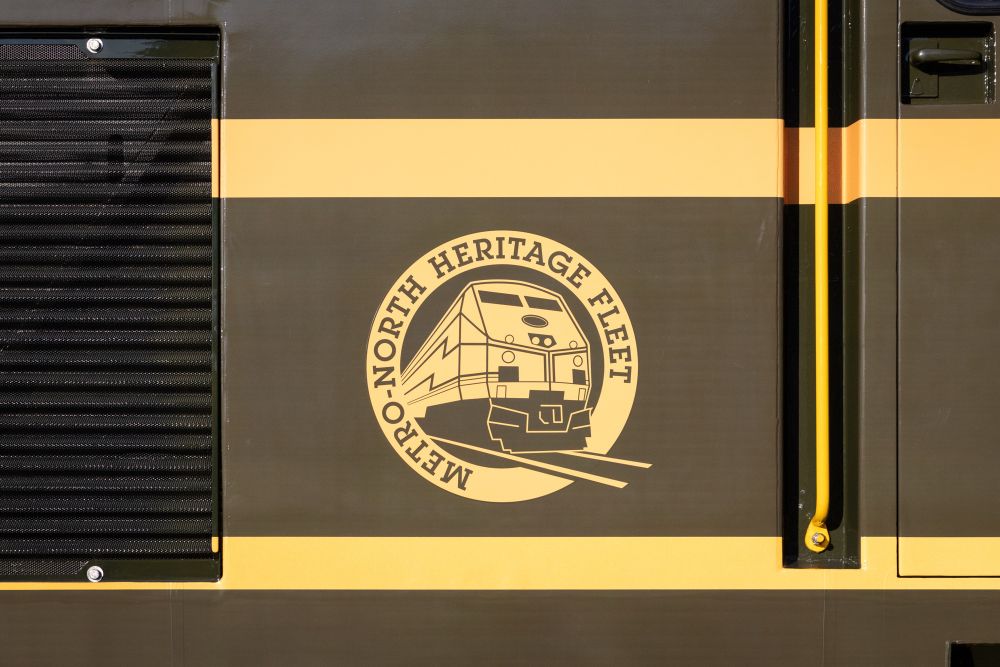 An up-close shot of the heritage unit logo, which reads: “Metro-North Heritage Fleet.”