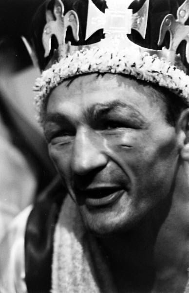 Boxer Carmen Basilio wearing a crown after a bout with Tony DeMarco at the Boston Garden in 1955. (Basilio by a TKO in the 12th round.) Photograph by Grey Villet