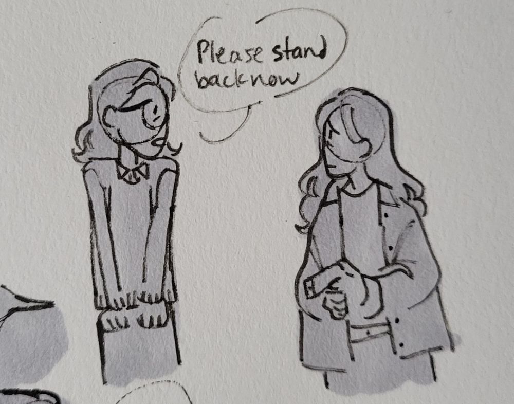 A continuation of the previous drawing, Pete is standing awkwardly and Steph is looking at him with sorrow holding a gun as he says, "Please stand back now"