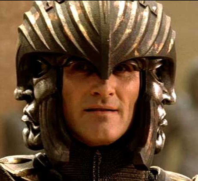 The Lord Marshall from The Chronicles of Riddick (middle aged white man) with a smug look on his face