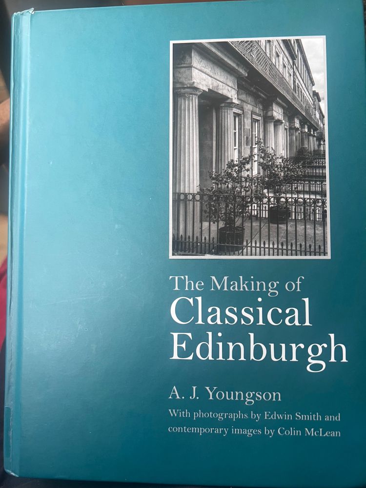 Cover of the book. Title and author name in white serif text on the green background with a small inset black & white photograph of Regent Terrace