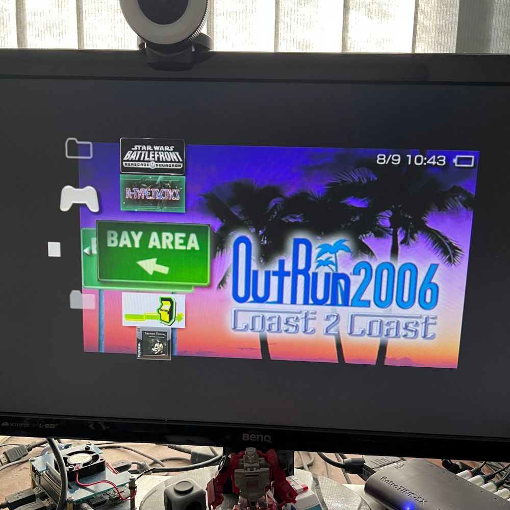 Snapshot of my PC showing the capture of my PSP Go’s home screen with “Outrun 2006: Coast to Coast” selected.