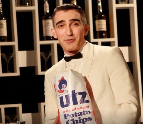 Shot of insult comic Jimmy Barrett (Patrick Fischler) filming Utz chips commercial in Mad Men season two episode ‘The Benefactor’