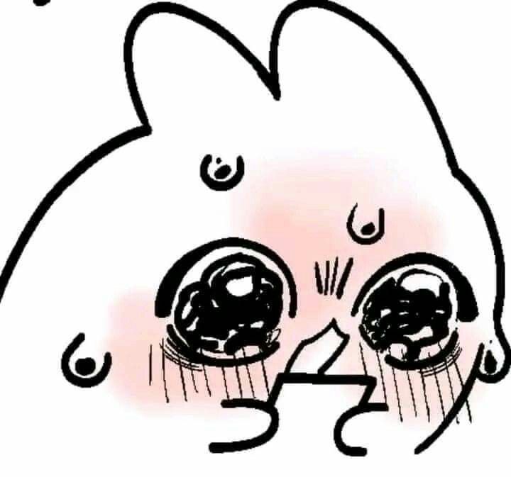 A drawing of a blushing bunny looking at their phone