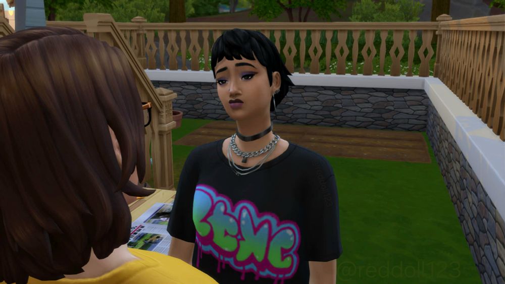 A screenshot of the Sims 4 version of my OCs Tom P. and Jamie. Jamie's frowning with a bored pout after hearing Tom P.'s story.
