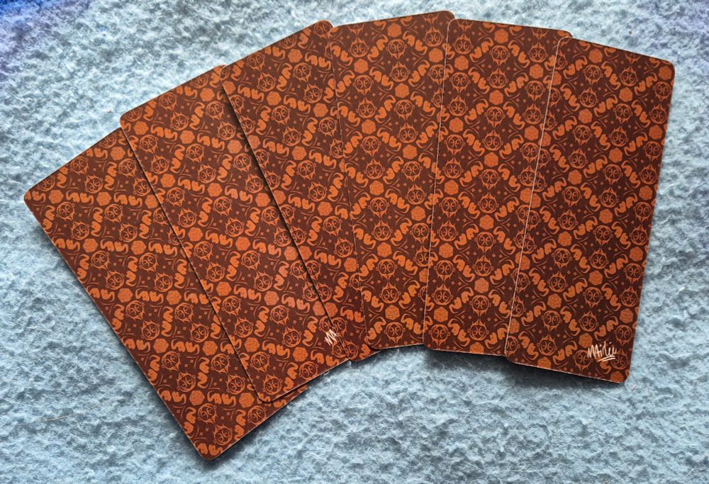 back of the boookmarks with a diamond shape repeating pattern