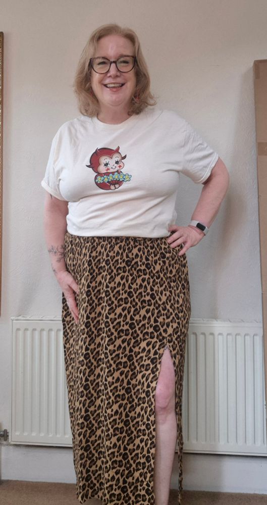 Berry in a Currls t-shirt and a leopard print t-shirt
