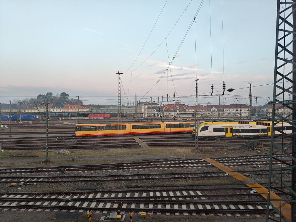 View from my hotel room in Karlsruhe, overlooking train tracks, with two trains visible.