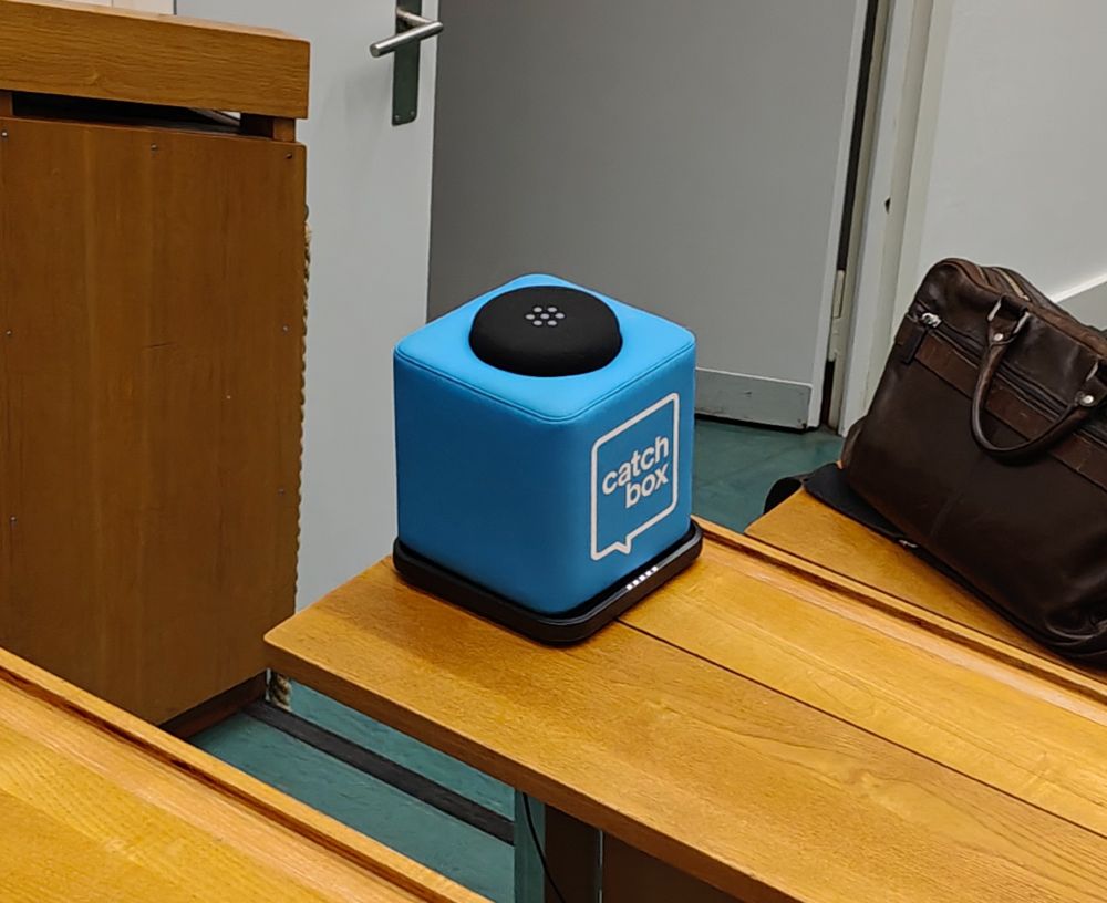 "Catch box" microphone that is soft so can be thrown across the room.