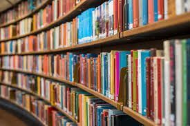 Curving shelves of books