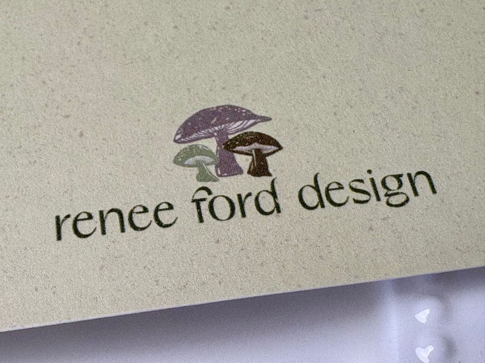 Card with Renee Ford Design logo featuring little mushrooms.