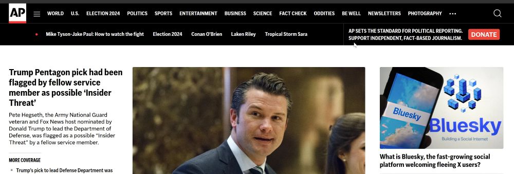A screenshot of the top section of AP News from November 15, 2024 with some Trump fuckery or other on the left and and article "What is BlueSky..." on the right. Have we made it? Is there nowhere left to run in this world when you just want to see pretty pictures and shitpost?
