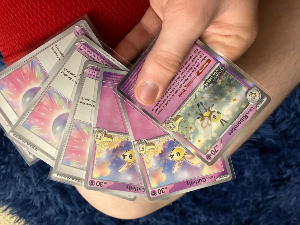 Various common cards in the Lillie line (cutie fly and Lillie’s pearl). 