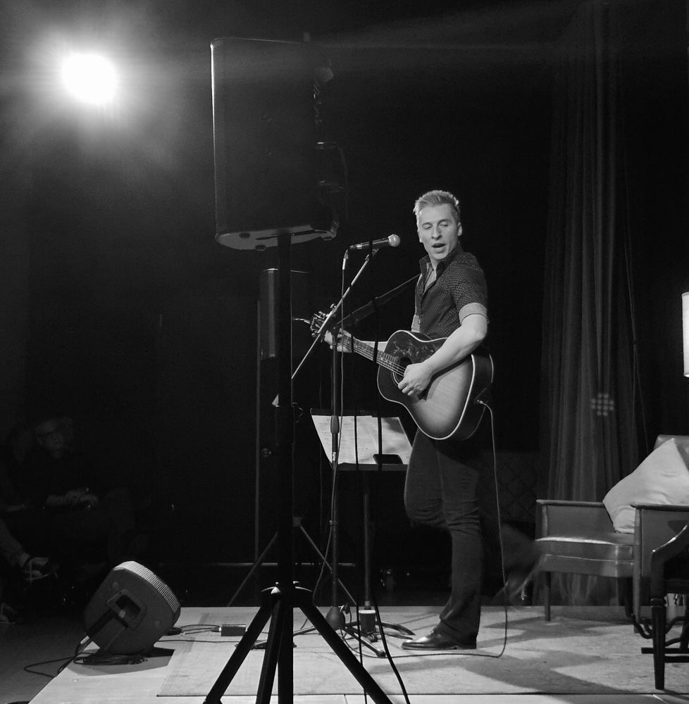 Singer-songwriter Chris Milam performing live in The Green Room in Memphis, TN